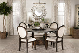 Set of two Twyla Dining Chairs with plush cream cushions and oval backs