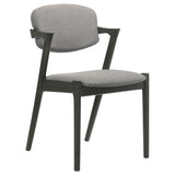Side angle of Stevie Upholstered Side Chair showing padded demi arm and fabric upholstery