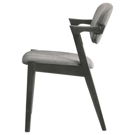 Close up of brown-toned grey fabric and cushioned seat on Stevie side chair