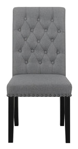 Side angle view of Alana tufted side chair with nailhead trim