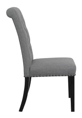 Close-up of tufted backrest and nailhead trim on Alana chair
