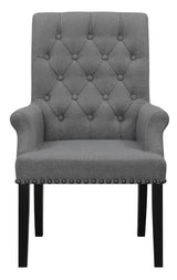Side angle of Alana Upholstered Arm Chair highlighting copper nailhead trim