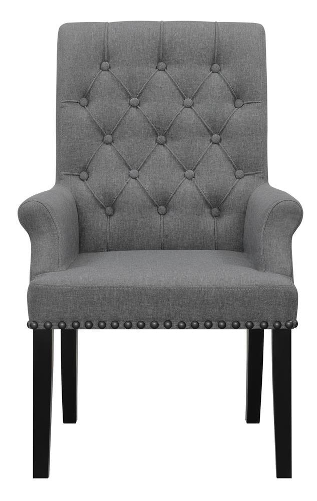Side angle of Alana Upholstered Arm Chair highlighting copper nailhead trim
