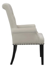 Close-up of nailhead trim and tufted button detail on Alana chair