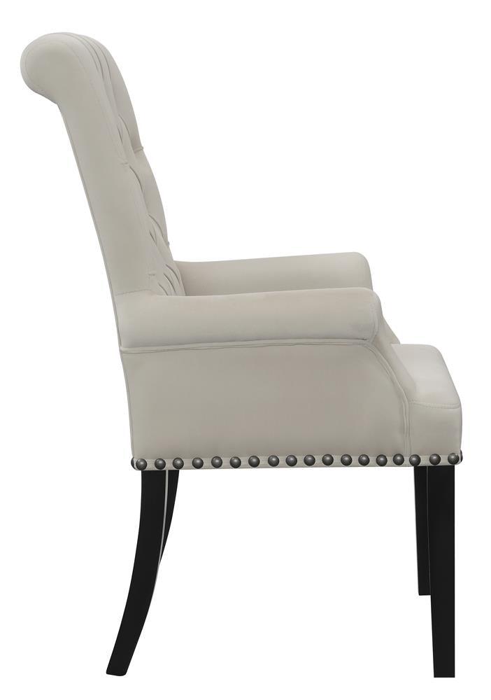 Close-up of nailhead trim and tufted button detail on Alana chair