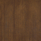 Detail of seat cushion and tapered wood legs on Dewey Upholstered Chair