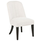 Leandro dining chair side angle showing fabric upholstery