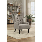 Charisma taupe fabric tufted accent chair angled front view