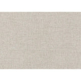 Close-up of Avalon chair textured beige upholstery and nailhead trim