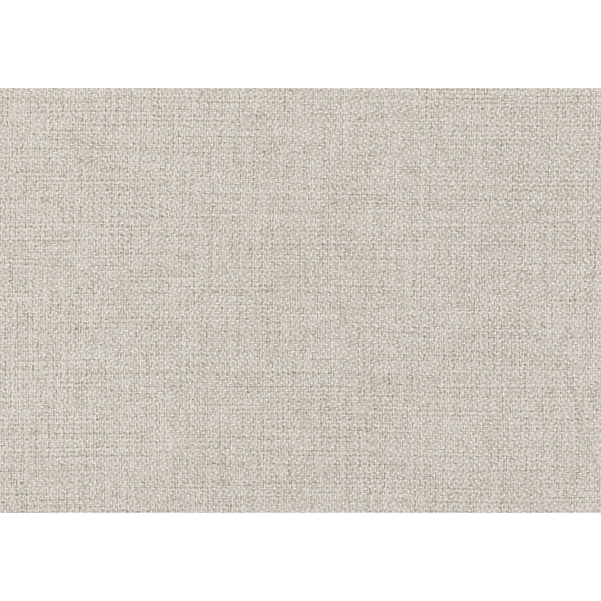 Close-up of Avalon chair textured beige upholstery and nailhead trim