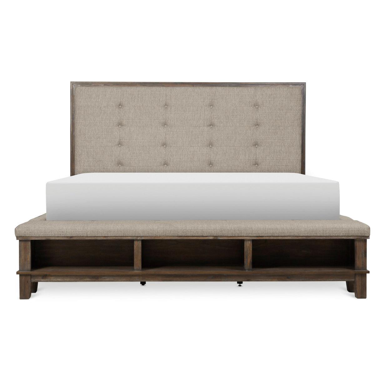 Gray tufted upholstered queen panel bed front view