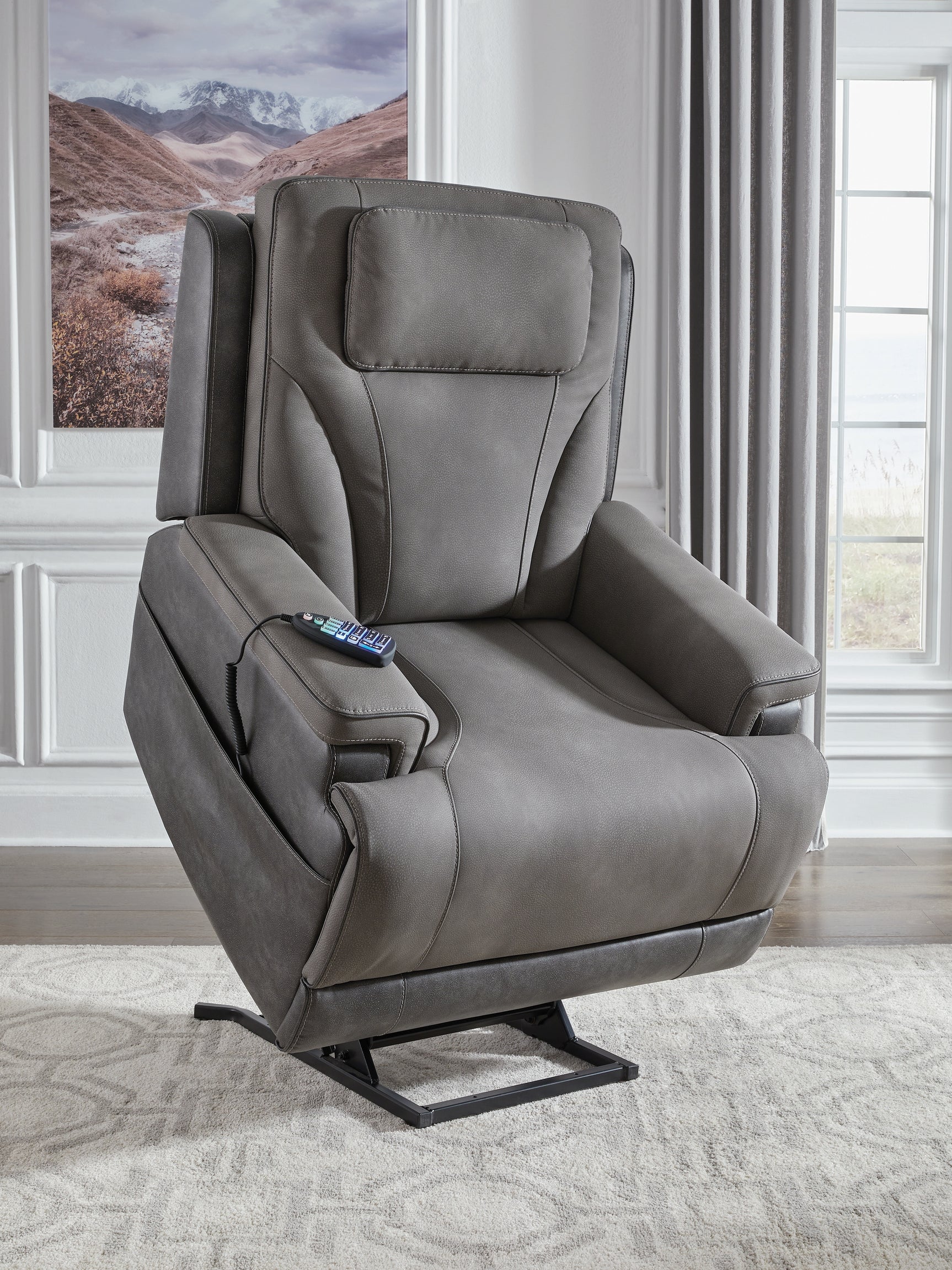 Headrest adjustment detail on Ashley power lift recliner