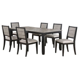 Detail view of Elodie dining table black and gray finish