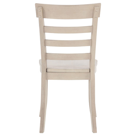 Detail of linen upholstered seat on Orrison ladder back chair