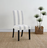 Side view of Herran beige upholstered dining side chair