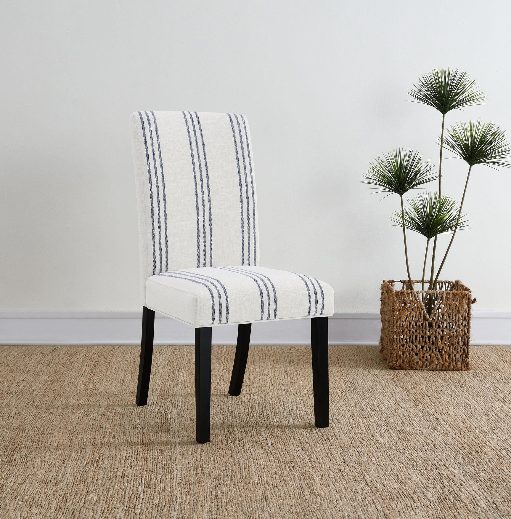 Side view of Herran beige upholstered dining side chair