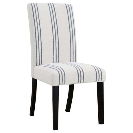 Back view of Herran beige upholstered dining side chair showing black frame