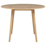 Close-up of tapered Asian hardwood legs with plastic glides