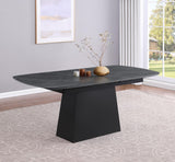 Potero dining table showing metal trapezoid base detail