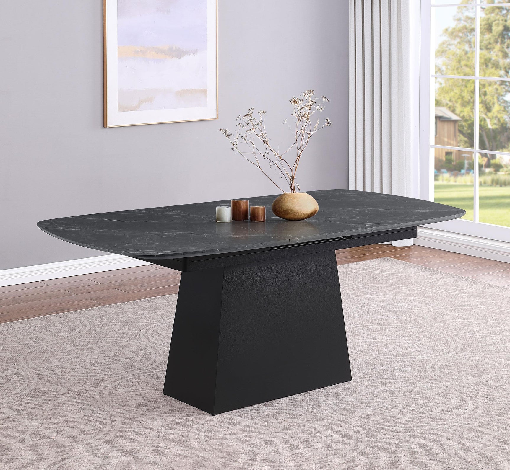 Potero dining table showing metal trapezoid base detail
