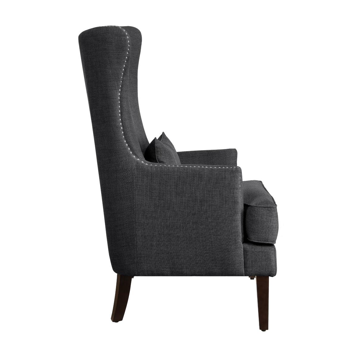 Avina Charcoal Fabric Wingback Accent Chair - closeup of nailhead trim and pillow