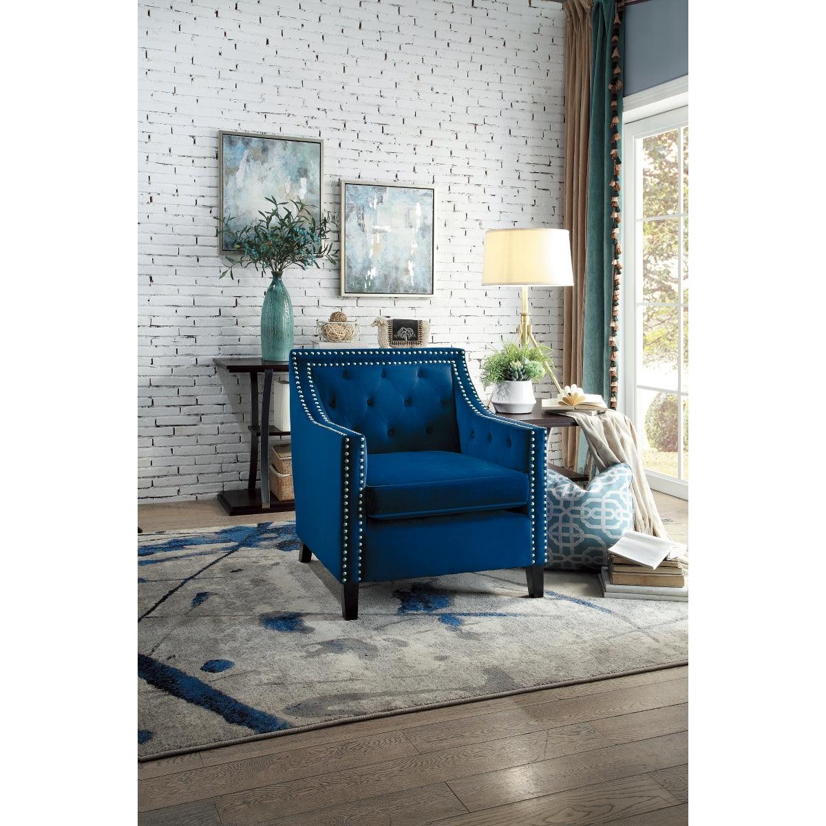 Grazioso navy velvet tufted accent chair in living room setting