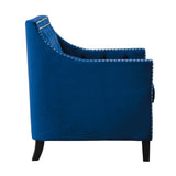 Close-up of button-tufted back and nailhead trim on Grazioso navy accent chair