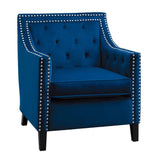 Side angle of Grazioso navy velvet tufted accent chair showing sloped arms