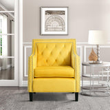 Close-up of button tufting on Grazioso yellow velvet accent chair