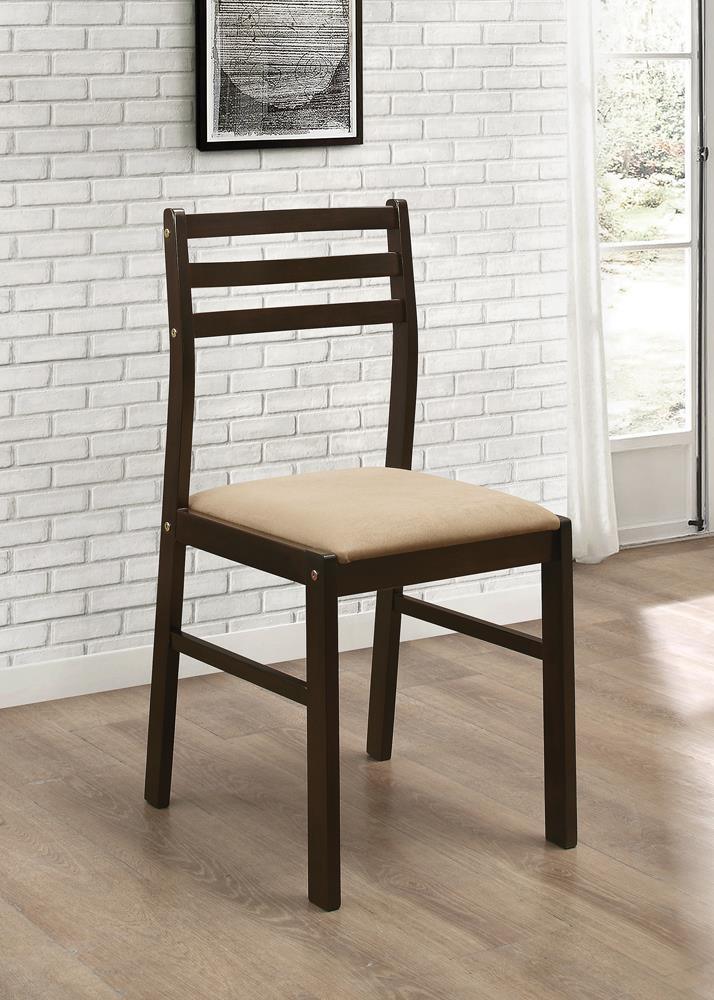 Close-up detail on cappuccino table finish and chair stitching