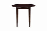 Side angle showing chair upholstery and table finish of G130005 set