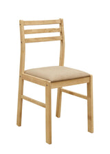 Side view of round dining table with chairs