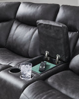 Console detail with cup holders and hidden storage