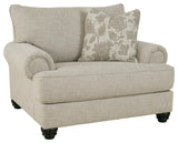 Asanti Oversized Chair side view showing roll arms