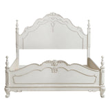 Close-up of Cinderella Queen Bed carved finial and floral motif