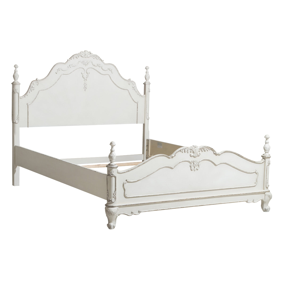 Detailed view of headboard floral carving and finials