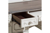 Open drawer of the Cinderella writing desk showing solid wood craftsmanship