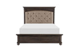 Side view of Motsinger brown fabric tufted panel bedroom bed