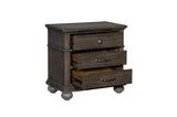 Open view of dresser drawer in Motsinger bedroom set