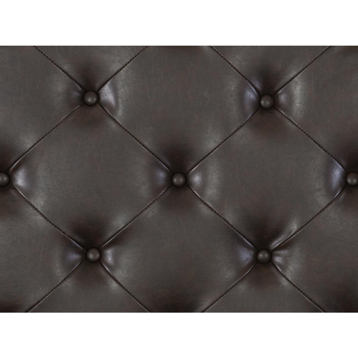 Fabric detail of dark brown faux leather upholstery