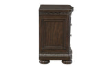 Bedroom view of nightstand and chest piece from Beddington set
