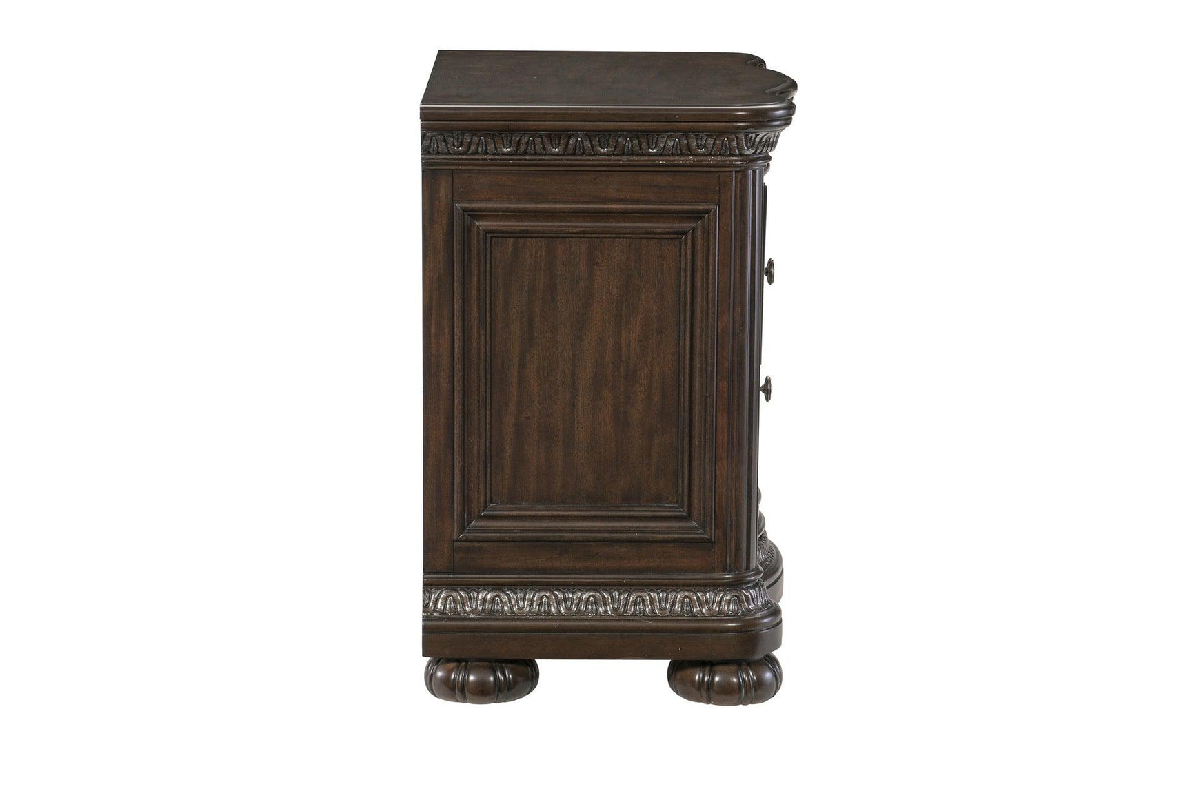 Bedroom view of nightstand and chest piece from Beddington set