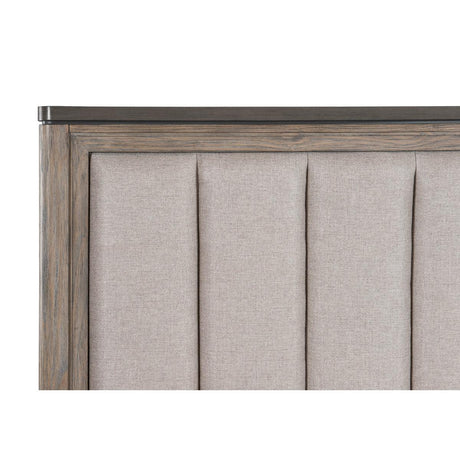 Close-up of light brown textured fabric upholstered headboard on Newell King Bed