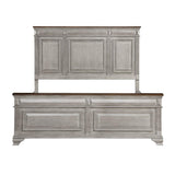 Close-up front view of Marquette two-tone oak veneer king bed headboard