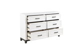 Side view of Garretson White Storage Platform Bedroom Set bed