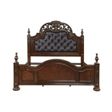 Close-up of button tufting on bed's faux leather headboard