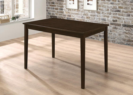 Room view of dining room set showcasing table, chairs, and bench