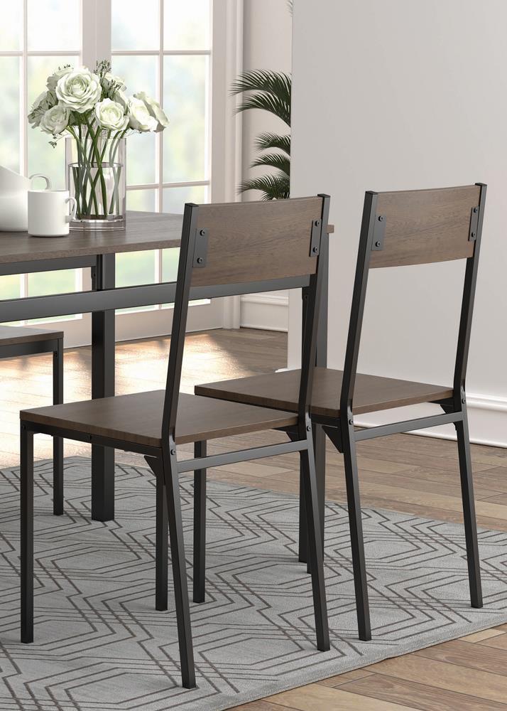 Close-up detail of wood-patterned tabletop and matte black metal legs on dining set