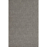Close-up of textured gray fabric upholstery on headboard