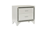Angled view of bedroom set with mirror and chest